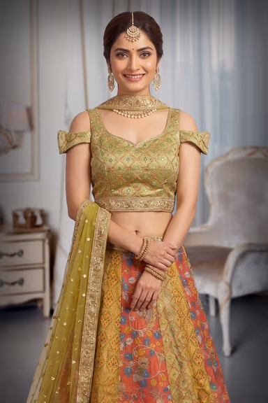 Yellow Haldi Lehenga With Multi Color Embellishments Detail In Skirt Part Along With Cold Shoulder Crop Top — view 1 of 3
