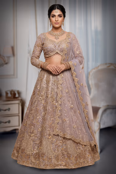 Exquisite Beige Lehenga Adorned With Heavy Gold Zari Work Intricate Floral Motifs And A Coordinating Sheer… — view 2 of 3