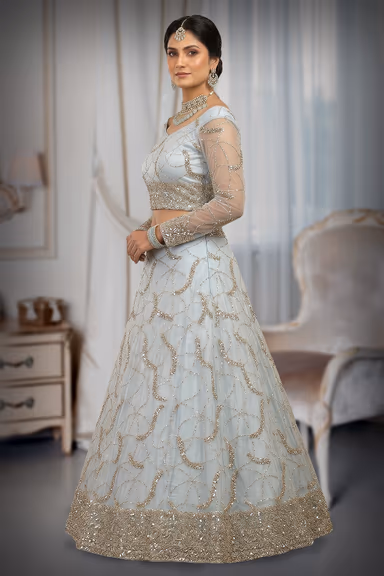 Elegant Light Blue Lehenga Featuring Intricate Silver Embroidery Sheer Full Sleeves And A Graceful Flowing… — view 3 of 3