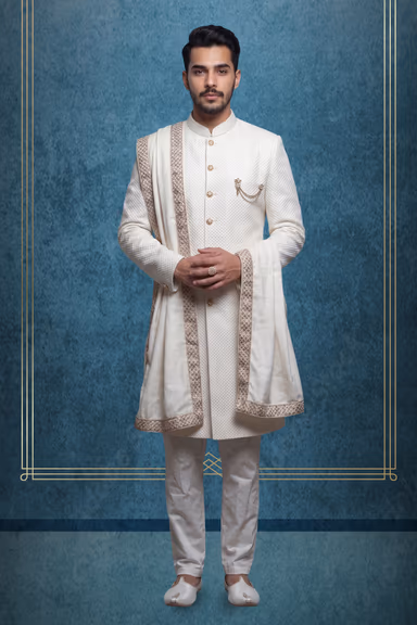 White Jaquard Fabric Heavy Jacket Sherwani With White handworked Inner Kurtha ,Matching Pants And White Shawl — view 1 of 3