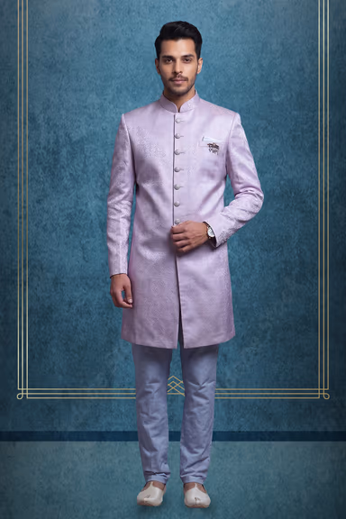 Light Pink Grooms Sherwani With Textured Details Along With White Pajama Pants — view 1 of 3