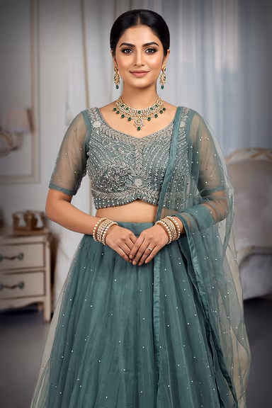 "Beautiful Sage Green Net Lehenga With Pearl Embellishments And Matching Blouse For Modern Wedding… — view 1 of 3