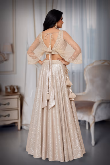 Pearl work with a sequencedskirt creating a gather sleeves. — view 4 of 4