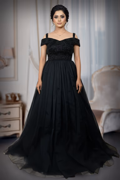 Exquisite Black Evening Gown Featuring A Shimmering Embellished Bodice And A Voluminous Flowing Skirt For A… — view 2 of 5