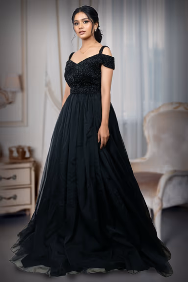 Exquisite Black Evening Gown Featuring A Shimmering Embellished Bodice And A Voluminous Flowing Skirt For A… — view 4 of 5