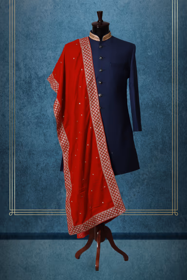 Saffron Red Elegant Grooms Sherwani With Golden Border Details — view 1 of 2