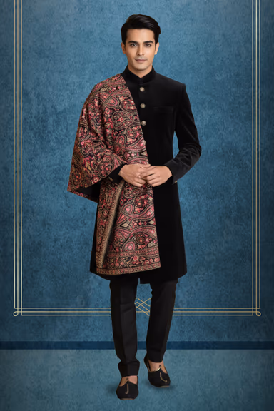 Exquisite Black Velvet Sherwani Featuring Vintage Metallic Buttons Paired With A Luxurious Intricately… — view 1 of 2