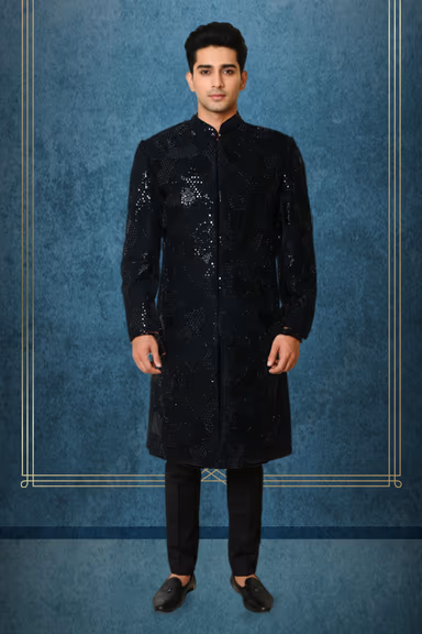 Stunning Black Sherwani Featured With Intricate Sequins And Beadwork. Its Long Silhouette Is Accented By A… — view 1 of 2