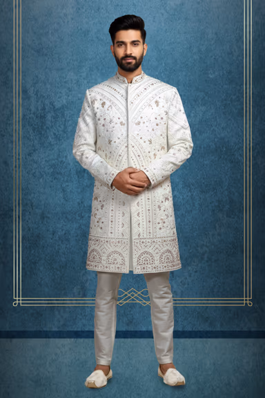 White Grooms Sherwani With Heavy Threadwork Details Along With Same Color Pant — view 1 of 2