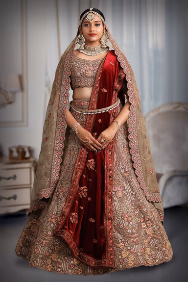 Chiku colour heavy embroidery jarkan work lehenga — view 2 of 5