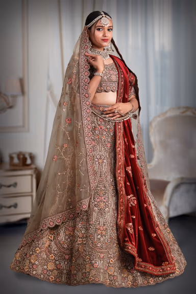 Chiku colour heavy embroidery jarkan work lehenga — view 3 of 5