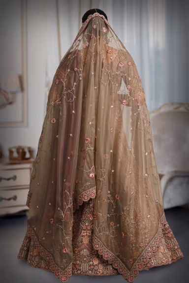 Chiku colour heavy embroidery jarkan work lehenga — view 5 of 5
