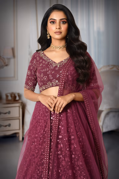 Vibrant Purple Sequined Lehenga Choli Set Featuring Intricate All Over Floral Work And Coordinating Sheer… — view 1 of 4