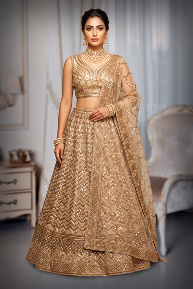 Champagne Gold Sequined Lehenga Adorned With Intricate Embroidery And A Sheer Embellished Dupatta. — view 2 of 3