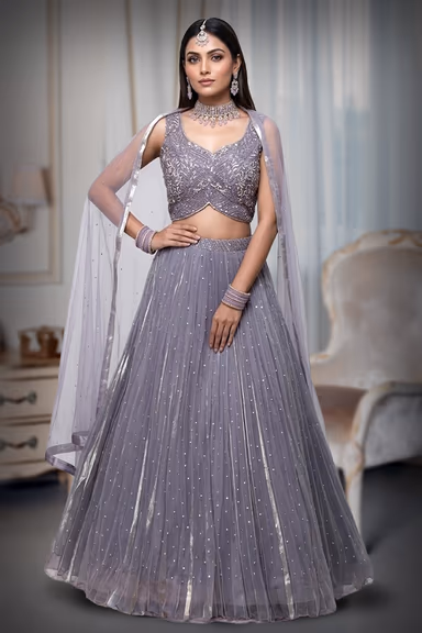 Dark Lavender Pre Wedding Lehenga With Uniform Stone Worked Skirt, Exquisite Stoneworked Crop Top Along With… — view 2 of 2