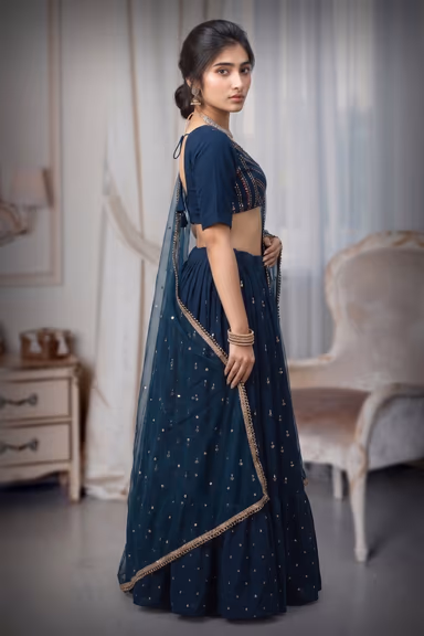 Deep Blue Georgette Flared Lehenga With Heavy Embellished Blouse And Net Dupatta — view 3 of 3