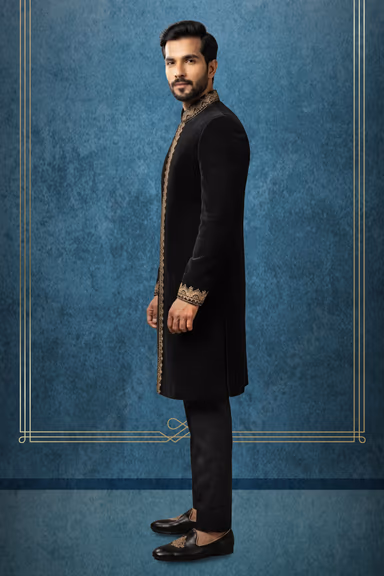 Experience Royal Grace In This Deep Black Velvet Sherwani Showcasing Exquisite Gold Embroidery Along The… — view 3 of 3