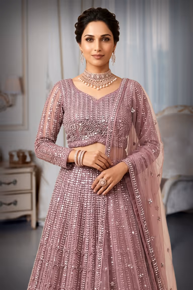 Glamorous Mauve-Pink Net Lehenga Set with All-Over Vertical Mirror-Work & Crystal Grid Embroidery — view 1 of 3