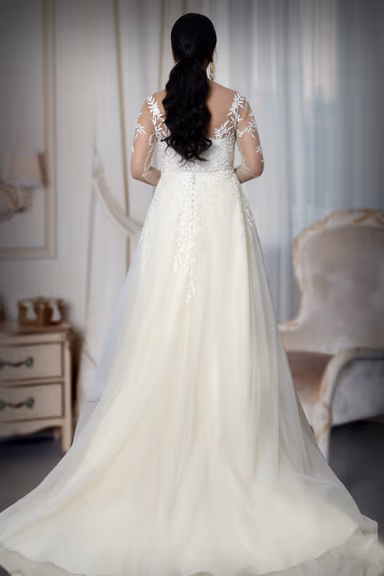 Elegant Off The Shoulder Ivory Bridal Gown Featuring Sheer Sleeves And Delicate Floral Embroidery Perfect For… — view 3 of 4