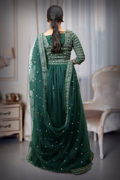 Beautifully Crafted Bottle Green Lehenga, Offering A Harmonious Mix Of Pastel Hues And Shimmering… — view 4 of 4