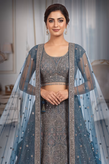 Cobalt Blue Heavy Handworked Bridal Lehenga With Golden Embellishments All Over The body And Beads Hanging In… — view 1 of 3