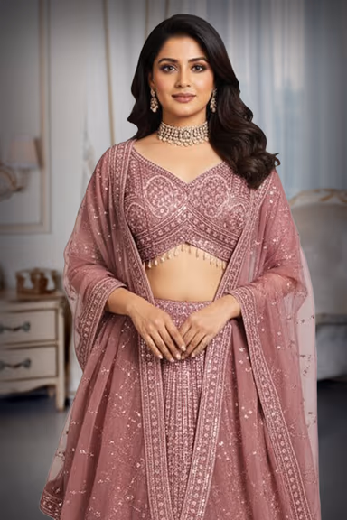 Flamingo Pink Handworked Bridal Lehenga With Intricate Embroidered Crop Top And Threadworked Dupatta — view 1 of 2