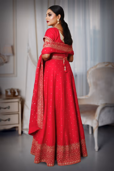 Glamorous Ruby Red Attire, Showcasing Elaborate Handwork And A Majestic Presence — view 3 of 3