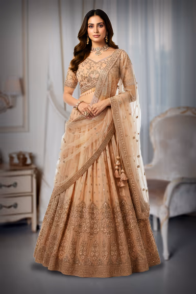 Graceful Pale Peach Lehenga Choli Set Detailed With Delicate Floral Embroidery And Shimmering Accents — view 2 of 2