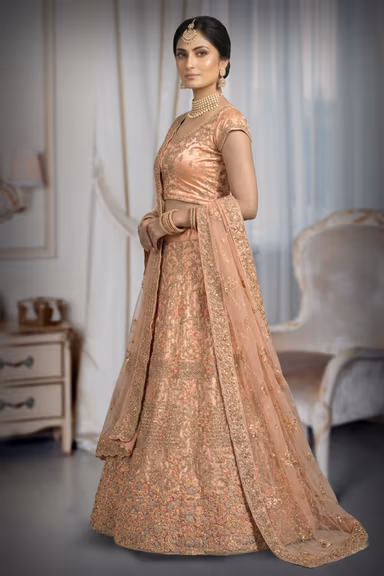 Gulnoor Peach Embroidered Zari Lehenga Set With Net Dupatta — view 3 of 3