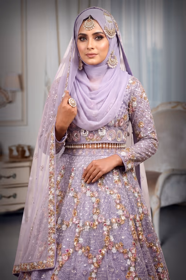 Lavender Lehenga Showcases Exquisite Floral Embroidery, A Captivating Blend Of Traditional Craftsmanship And… — view 1 of 4