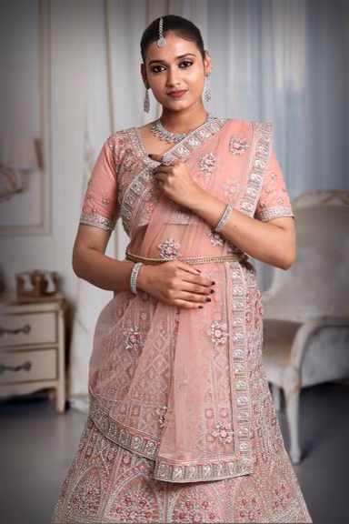 light peach silver color embroidery & Jarkan stone work lehenga — view 1 of 5