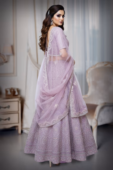 Lilac Lehenga with Intricate Cutwork and Stone Embellishments for Elegant Weddings and Celebrations — view 3 of 3