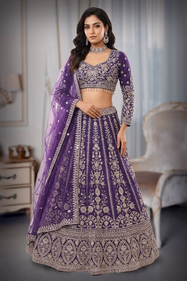 Majestic Deep Purple Lehenga Set With Heavy Silver Zari Embroidery, Intricate Borders, And Net Dupatta. — view 2 of 2