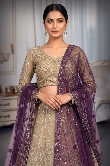 Metallic Golden Heavy Embellished Bridal Lehenga With Golden Stone And Purple Details On Skirt And Dupatta — view 1 of 3