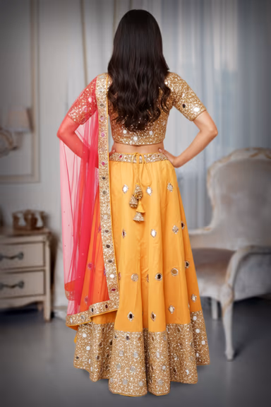 Heavy mirror work with a mustard lehenga — view 2 of 4