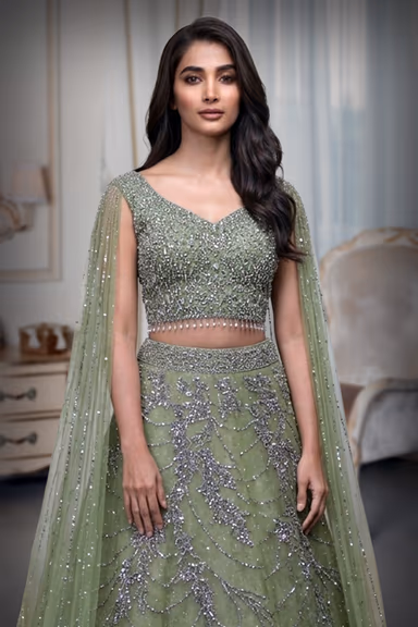Olive Green Pre Wedding Lehenga With Net Extended Cape Sleeve — view 1 of 4
