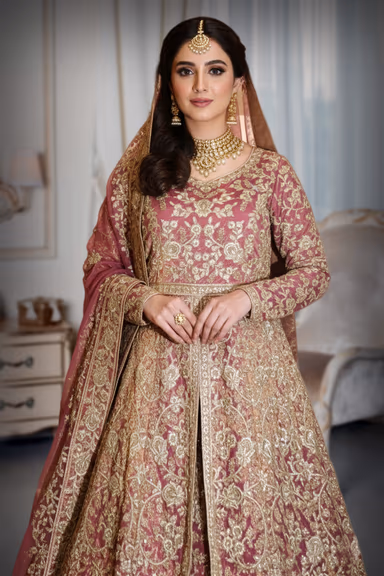 Elegant Onion Pink Arabic-Style Lehenga with Intricate Gold Embroidery, Skirt, and Dupatta — view 1 of 4