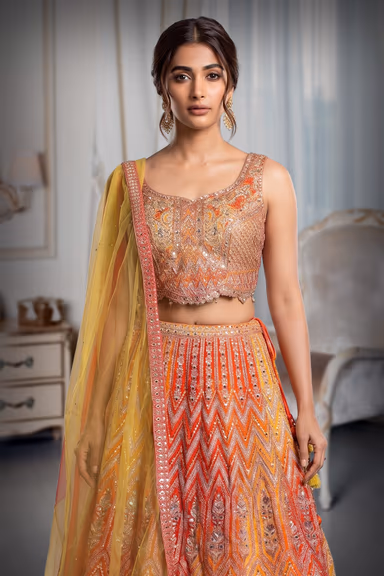 Orange And Yellow Ombre Shaded Lehenga With Heavy Embelishment Of Threadworks — view 1 of 4