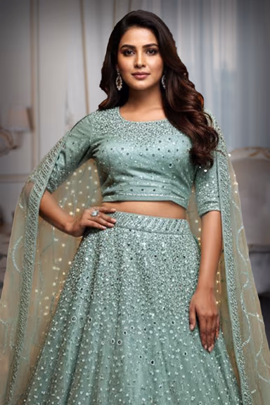 Pastel Green Net Lehenga with Heavy Mirror and Sequin Embellishments — view 1 of 2