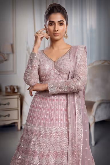 Pastel Peach Heavy Stone Worked Bridal Lehenga — view 1 of 3