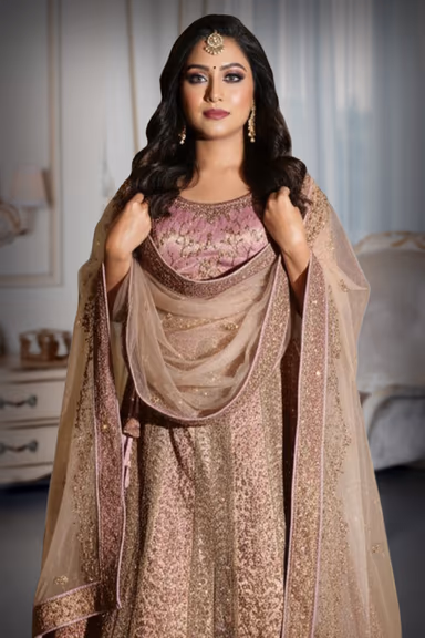 Elegant Pastel Pink lehenga, blazes with intricate embroidery and shimmering sequins — view 1 of 2