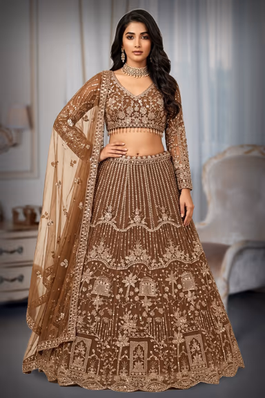 Regal Antique Gold Lehenga Set Showcasing Elaborate Zari Embroidery, Floral Motifs, And A Sheer Dupatta — view 2 of 2