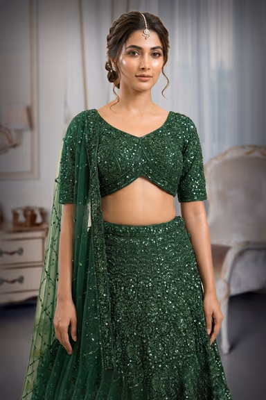 Regal Emerald Green Heavily Embellished Net Lehenga Choli with Concentric Sequin Motifs and Bead Fringe — view 1 of 2