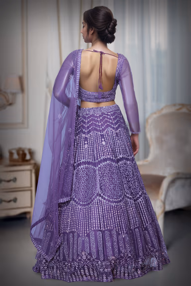 Regal Purple Net Lehenga With Stone Work Details And Raindrop Beads Detailing In Waist Line With Same Color… — view 4 of 4