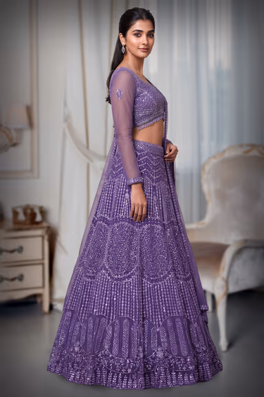 Regal Purple Net Lehenga With Stone Work Details And Raindrop Beads Detailing In Waist Line With Same Color… — view 3 of 4