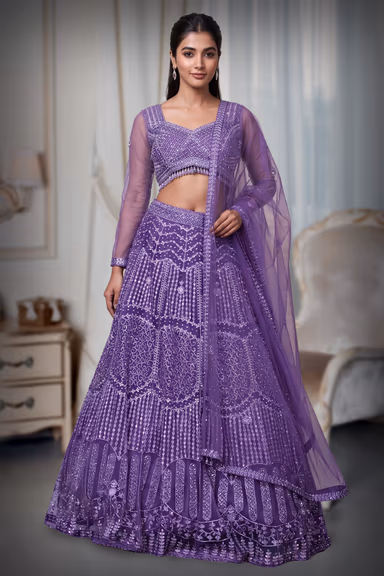 Regal Purple Net Lehenga With Stone Work Details And Raindrop Beads Detailing In Waist Line With Same Color… — view 2 of 4
