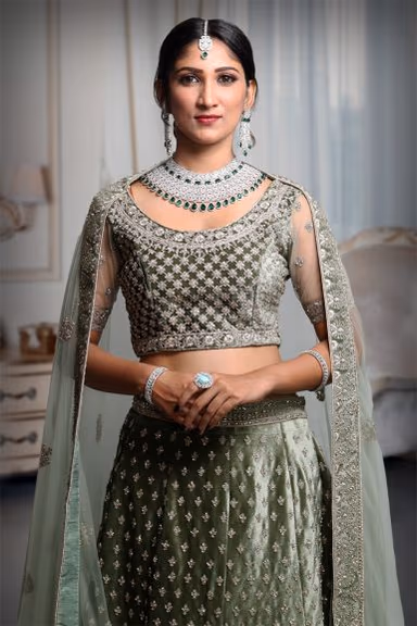 Sage Green Heavy Stone Worked Lehenga With Exquisite Detailing On Blouse And Dupatta — view 1 of 5