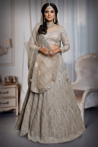 This Shimmering Golden Beige Lehenga Set Showcases Heavy Geometric Sequin Work Throughout The Skirt Paired… — view 2 of 2