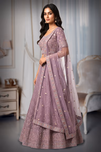 This Shimmering Pink Lehenga Set Showcases Heavy Geometric Sequin Work Throughout The Skirt Paired With A… — view 3 of 3