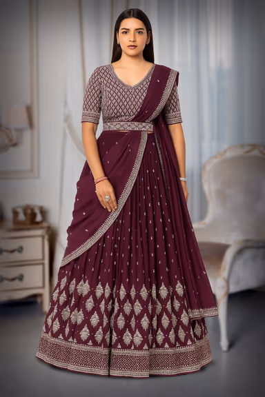 Wine Purple Pre Wedding Lehenga With Golden Threadwork Details — view 1 of 2